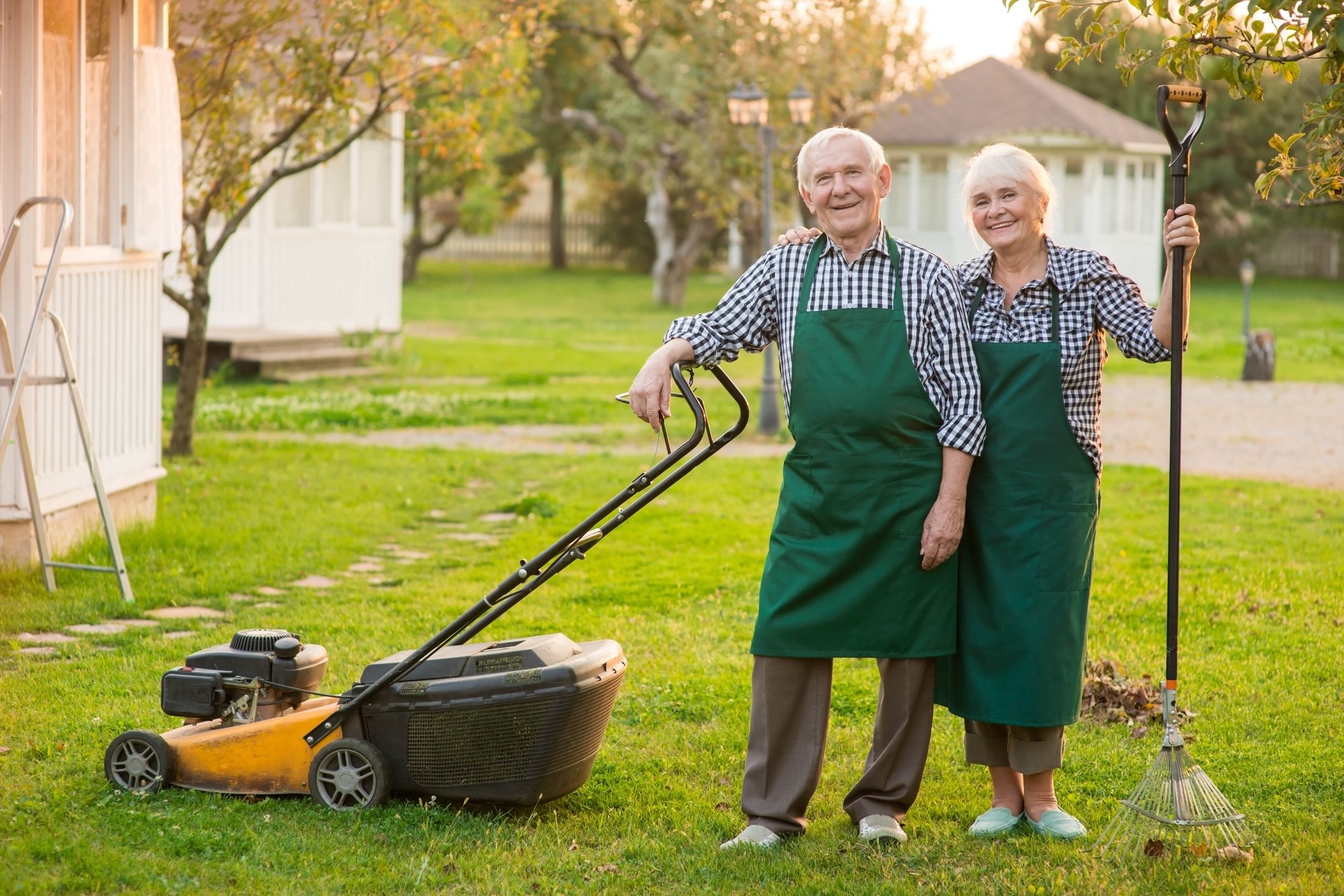 couple-of-old-gardeners-smiling-2021-08-31-17-03-17-utc-min